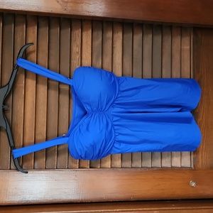 2 piece Royal blue bathing suit. Top and bottom size 14. Padded bra top, skirt.